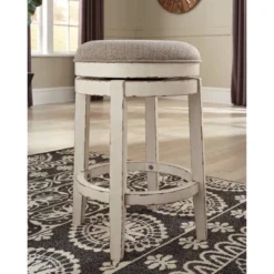 Realyn Upholstered Swivel Counter Height Barstool Beige - Signature Design By Ashley